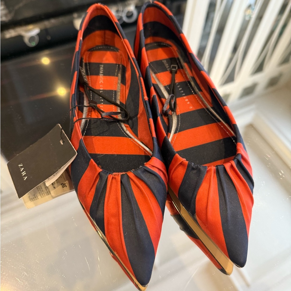 Brand new Zara Camper Red and Black Flats with Pointed Toe and Striped Design